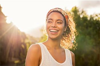 woman smiling outside